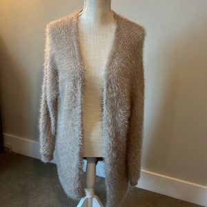 Dusty pink super soft oversized cardigan.  Nylon and acrylic.